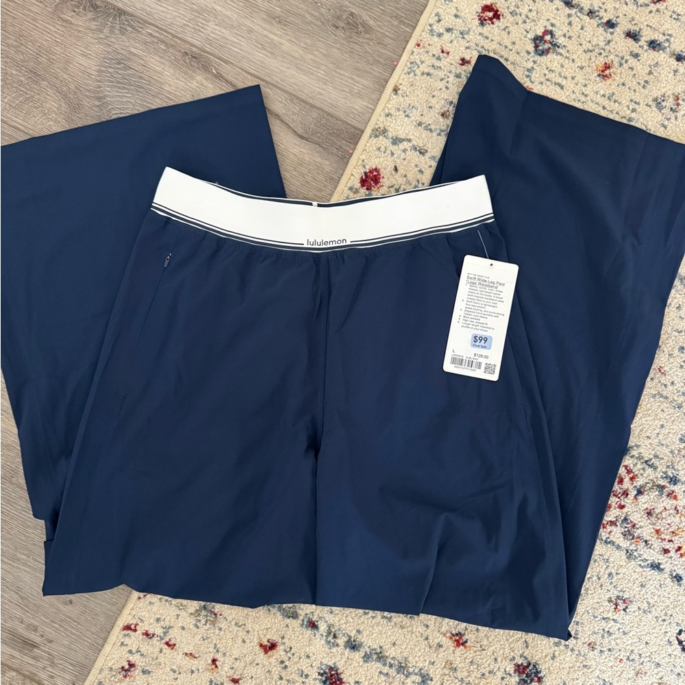 💙 Lululemon Swift Wide-Leg Pant with Logo Waistband – Navy, Size L (NWT)